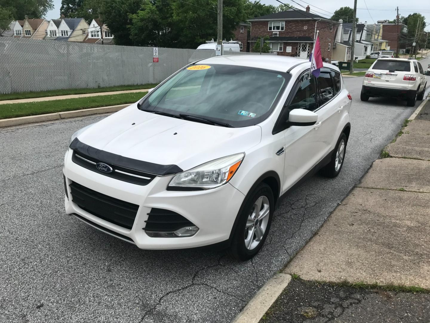 2016 White /Gray Ford Escape SE (1FMCU9GX9GU) with an 1.6 V4 engine, Automatic transmission, located at 577 Chester Pike, Prospect Park, PA, 19076, (610) 237-1015, 39.886154, -75.302338 - 2016 Ford Escape SE: Only 135k miles, 4x4, SUPER CLEAN, runs LIKE NEW! This vehicle comes inspected and has been given a bumper to bumper safety check. It is very clean, reliable, and well maintained. We offer a unique pay plan that is known for being the easiest and fastest financing option in t - Photo#3